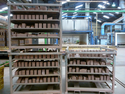 bricks on drying racks in factory