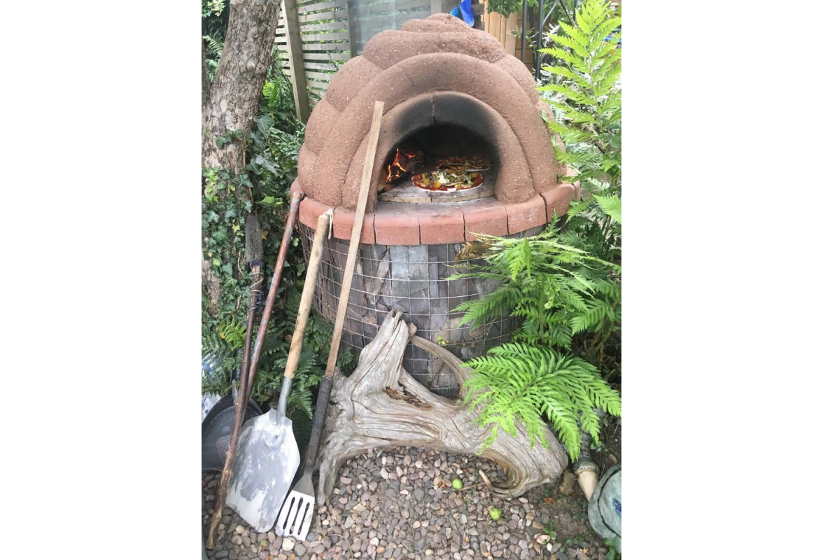 Pizza oven in use!
