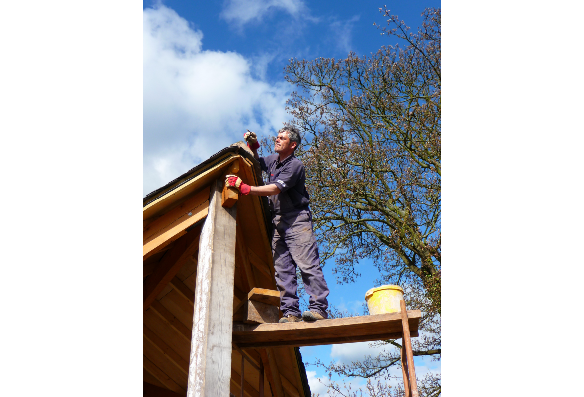 Huw completing tip of roof