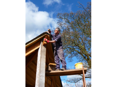 Huw completing tip of roof