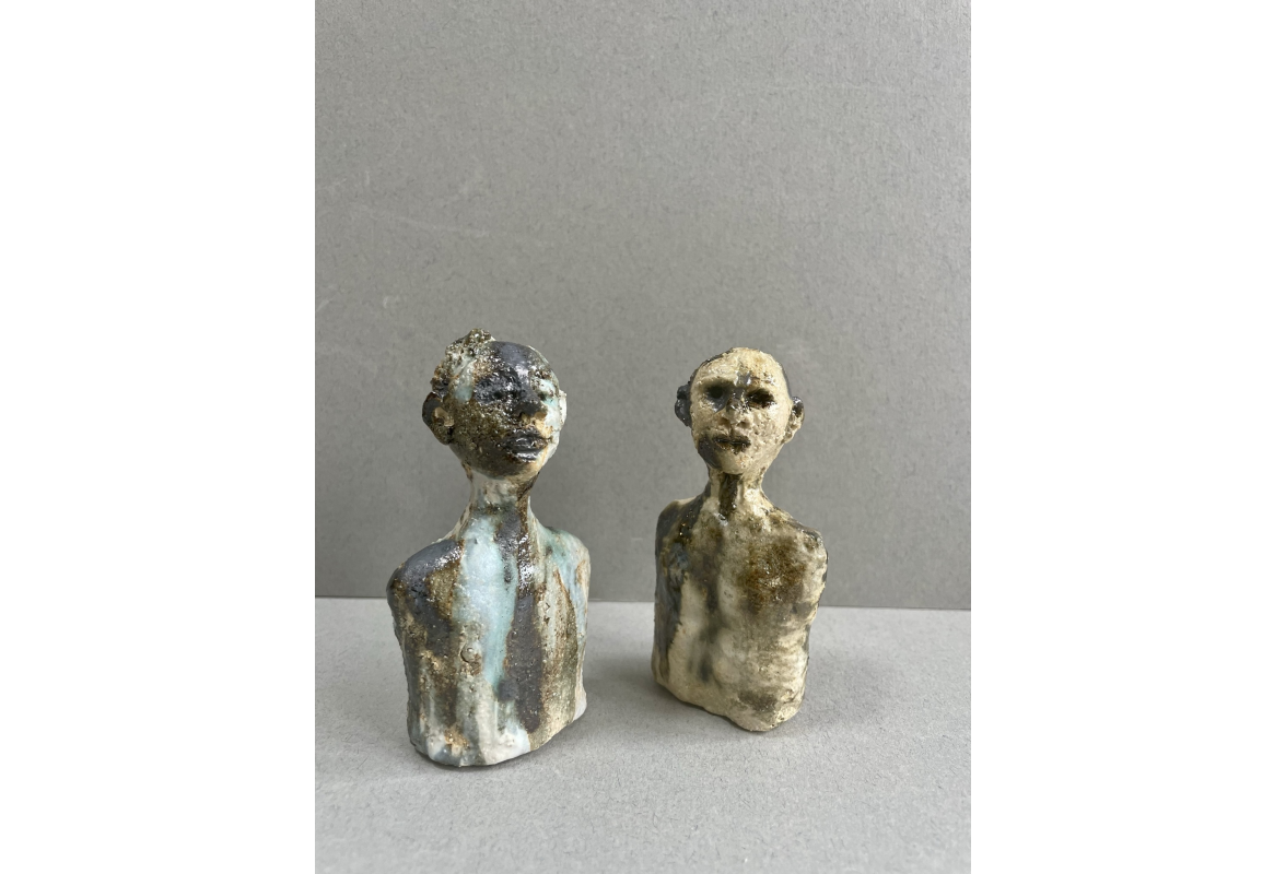 Two small figures