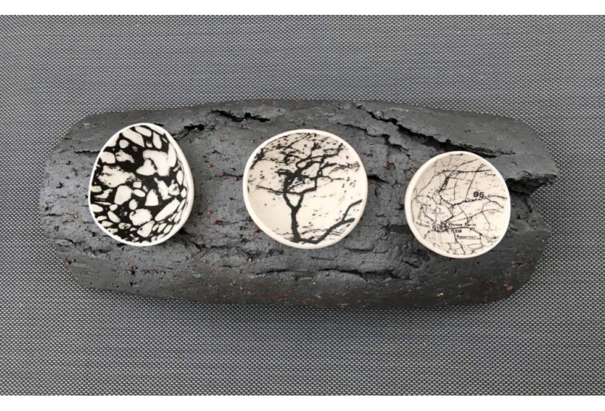 Bowls on brick branch