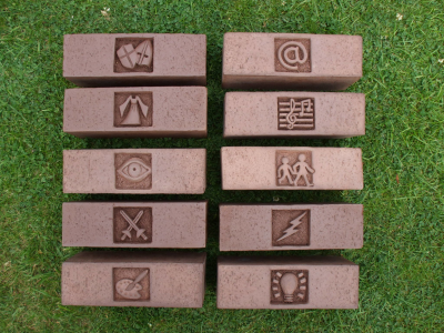 Carved brick symbols for museum project