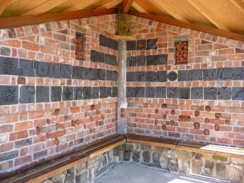 Carved brickwork inside the Bus shelter Cross House, Shropshire