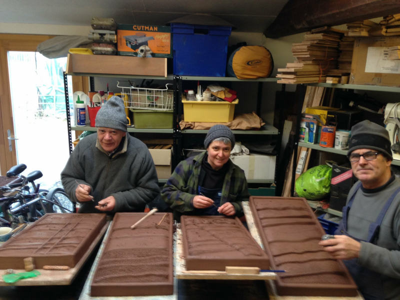 Team Benchart carving the piers