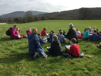 Jean and school children