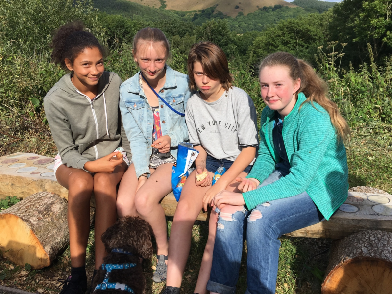 Friends enjoying the poetry bench