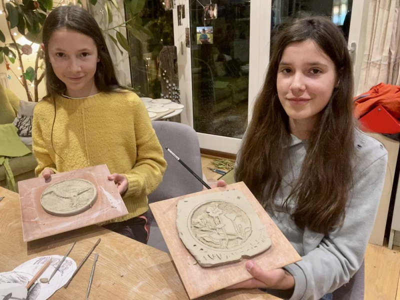 Natalia and Alessandra with their tiles