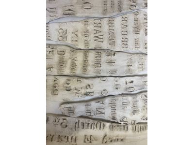 Decal of gravestone clay textures printed onto porcelain