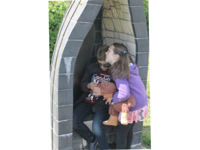 Kids inside brick boat