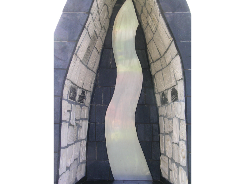 Inside of boat lined with tiles and textures, historical devals, poetry and a silver waterway