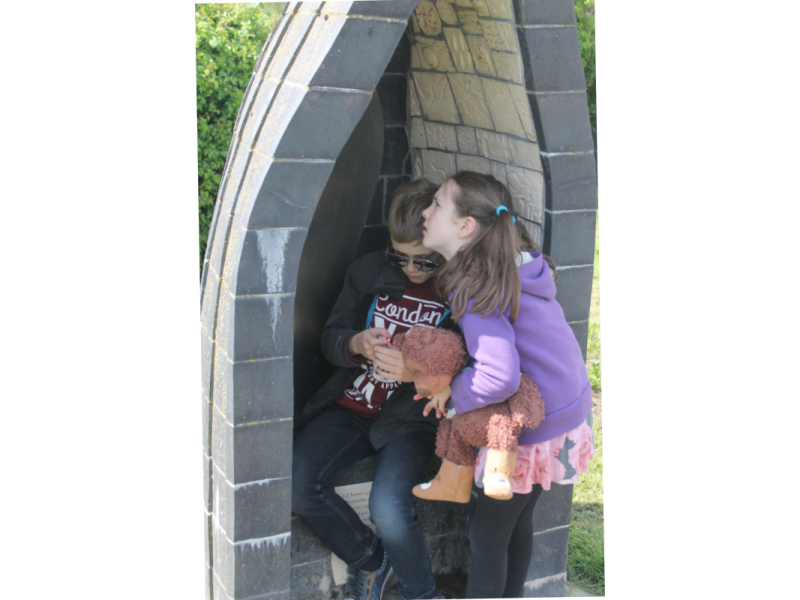 Kids inside brick boat