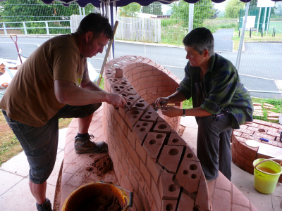 Stuart and Ruth brick laying together